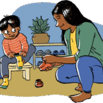 Child putting on their socks with parent supporting them